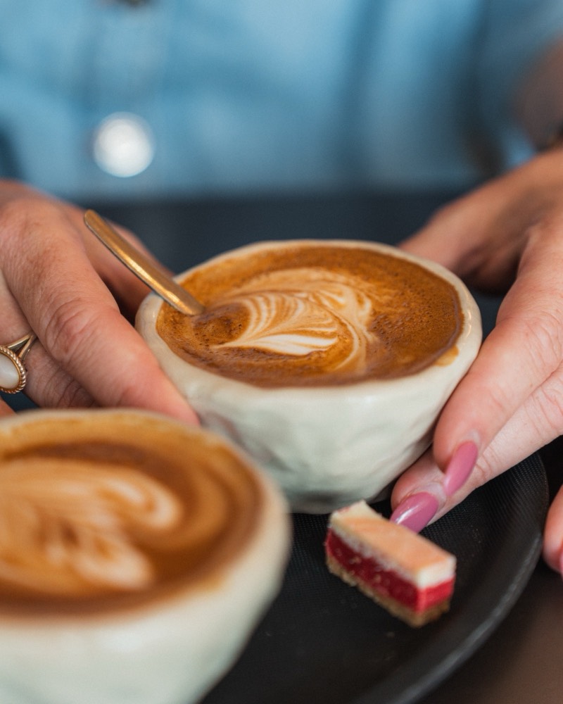 Handmade ceramic cup with latte art